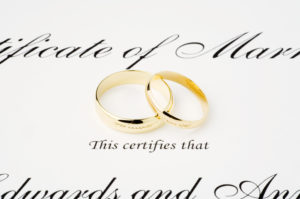 Marriage Certificate and Wedding Rings